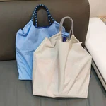 Eco-friendly Multi-color Extendable Width Shopping Handbag Fashionable Nylon Mat. Fixed Price $28.99.