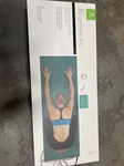 Gaiam Yoga Beginner's Kit - 4mm Mat, Strap, Brick, & Workouts Teal. Fixed Price $29.00.