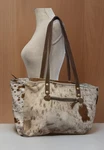 Myra Bag Fawn & White Upcycled Canvas Cowhide. Fixed Price $49.88.