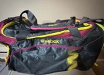 Reebok Gym Bag Women's Duffle Shoulder Strap Name Tag Magenta Yellow 21 Inch. Fixed Price $35.99.