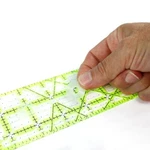 The Gypsy Quilter No-slip Grip Dots, Adhesive Grippers For Rulers. Fixed Price $5.99.